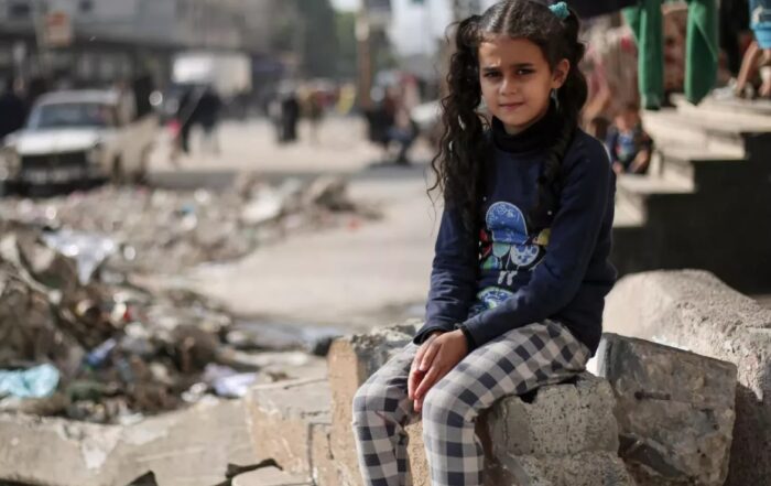 Feb donation to unicef - kid in war surroundings