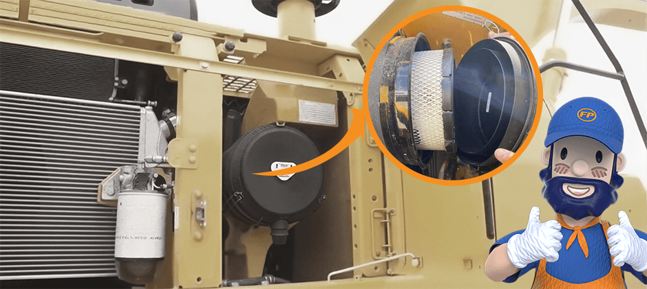 A diagram showing a clean cabin air filter with an orange arrow pointing to its installation location on a heavy-duty cabin.