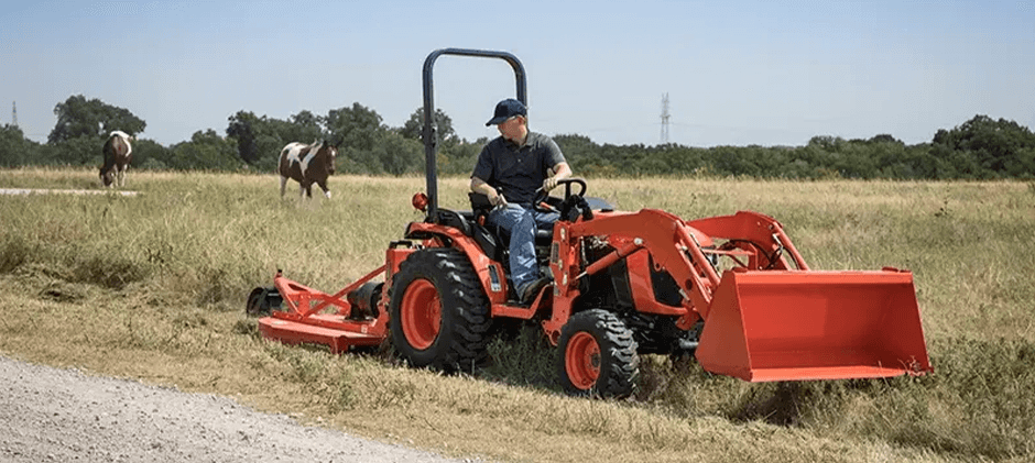 A-person-is-operating-a-small-tractor-on-the-farm.