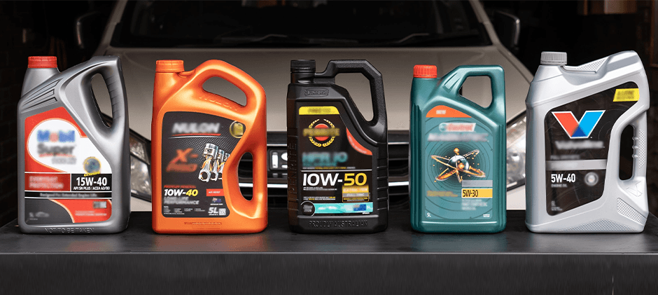 A selection of engine oil bottles showing various viscosity grades, such as 15W-40 and 5W-30, highlighting the importance of choosing the correct oil.