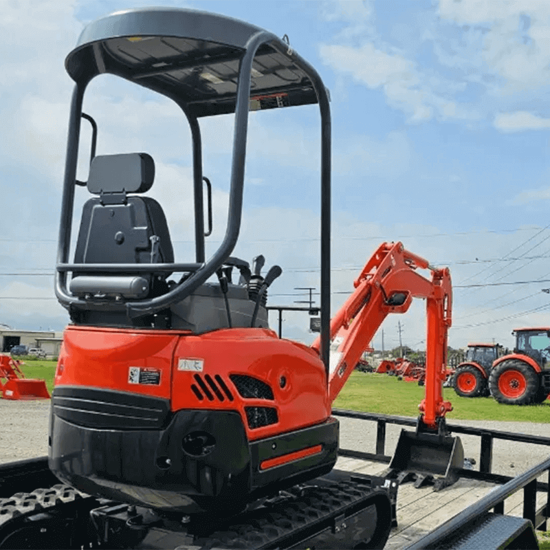 Kubota U-Series: Agility for Tight Spaces A Kubota U-Series mini excavator with an open canopy, highlighting its compact, zero-tail swing design.