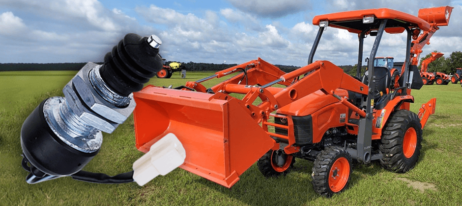 Close-up of Kubota tractor safety switch next to the loader.