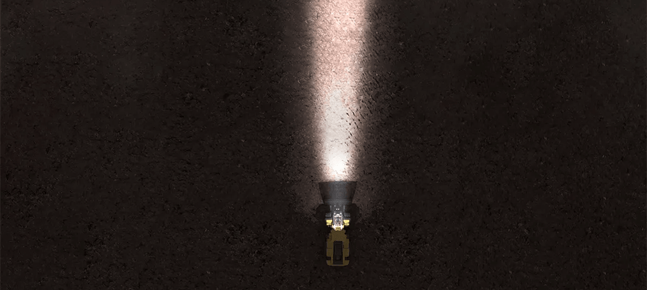 An illustration showing the narrow, long-distance beam of a spot beam pattern from an LED work light.