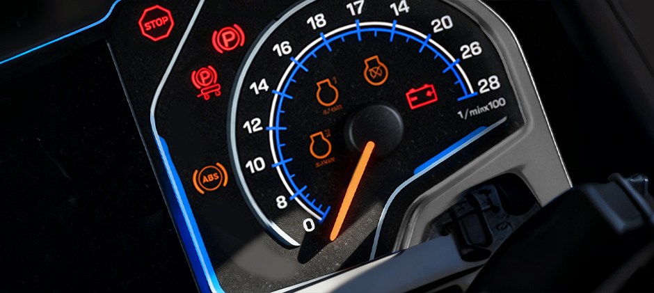 An illustrative graphic asking 'What Does the Tractor ABS Light Mean?' with an arrow pointing to the ABS symbol on a dashboard and a confused mechanic character.