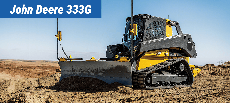 A John Deere 333G compact track loader uses a dozer blade to level ground on a large construction site, showcasing its power for heavy-duty work.