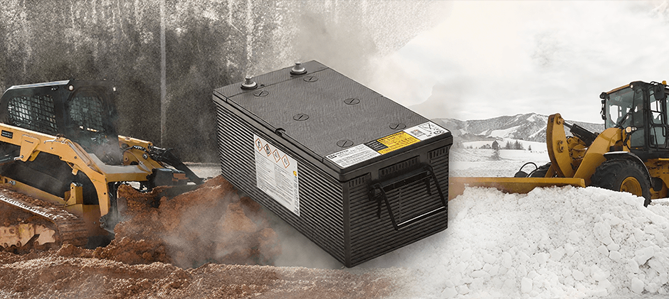 A heavy-duty battery for construction equipment, shown between a skid steer digging dirt and a wheel loader plowing snow.