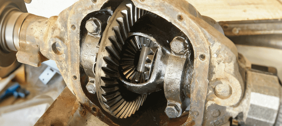 Internal gears of a heavy equipment rear differential, which are protected by high-viscosity gear oil.