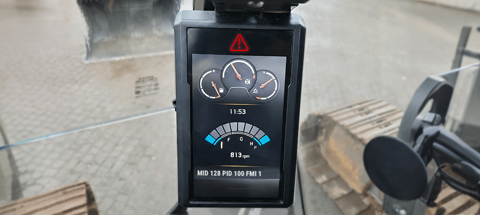 A Volvo Co-Pilot display showing a critical fault warning with the specific code 'MID 128 PID 100 FMI 1' displayed at the bottom.