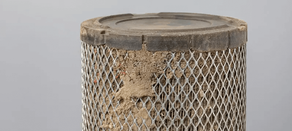 A close-up view of a severely clogged air make engine starts but won't stay running