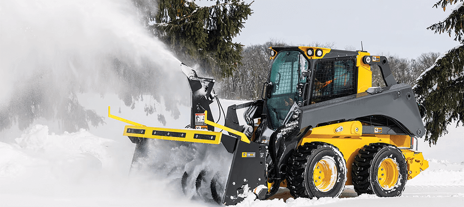 Skid Steer Working on Snow Removal
