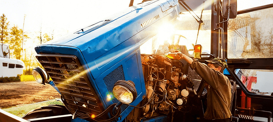 Refueling the tractor's diesel engine.