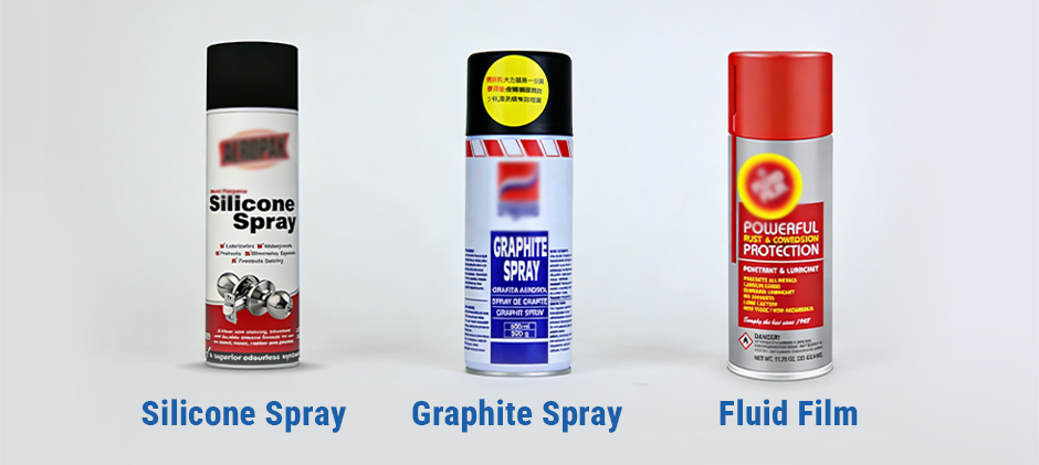Three cans of popular mower deck coatings lined up: Silicone Spray, Graphite Spray, and Fluid Film.