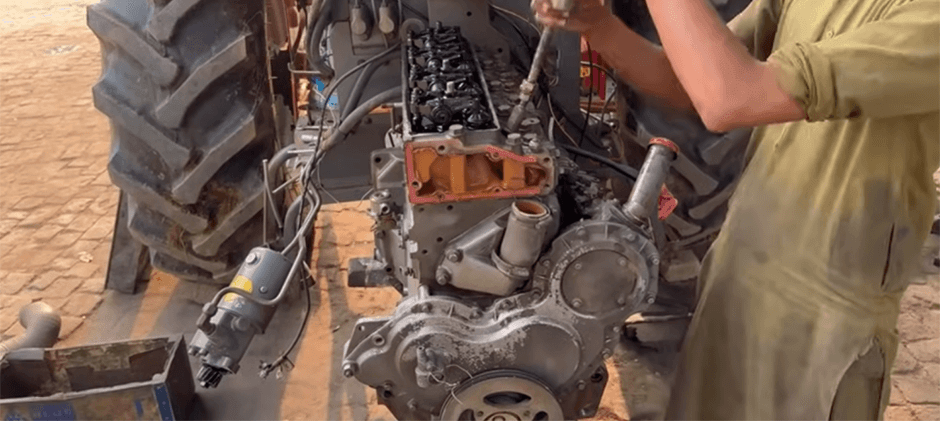 Repairing a Tractor Engine