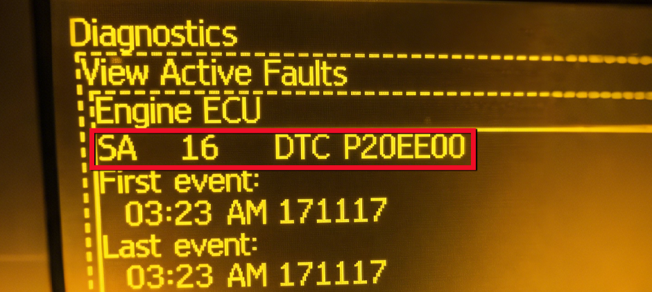 A close-up of a machine's diagnostic screen displaying the engine fault code SA 16 DTC P20EE00.