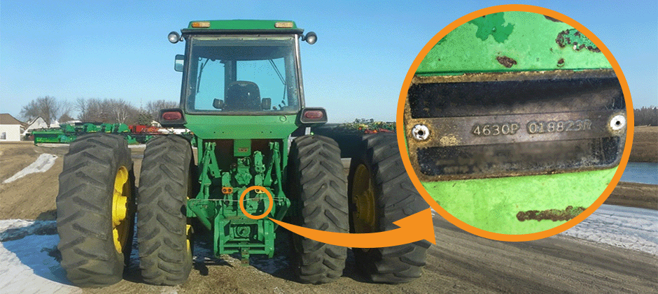 Rear view of a John Deere 4630 tractor showing the location of the serial number plate above the PTO shaft, with a close-up view of the plate.