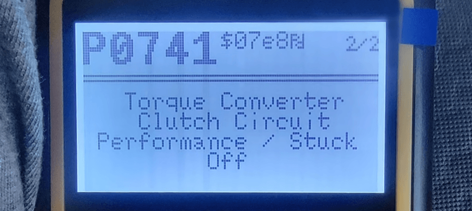 A close-up of a diagnostic scan tool screen showing the fault code P0741, defined as "Torque Converter Clutch Circuit Performance / Stuck Off".