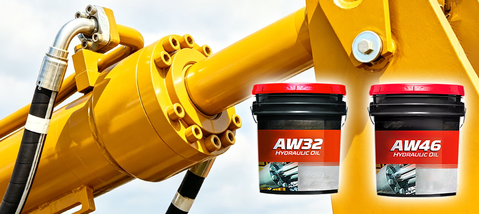 Pails of AW32 and AW46 hydraulic oil shown in front of a large yellow hydraulic cylinder on a piece of heavy equipment.