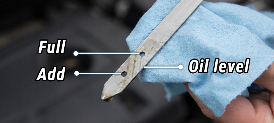 How to check the engine oil level with dipstick