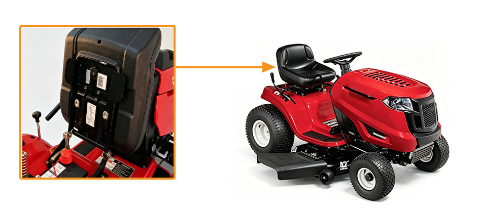 Arrow pointing to the serial number identification tag located under the seat of a Troy-Bilt riding mower.